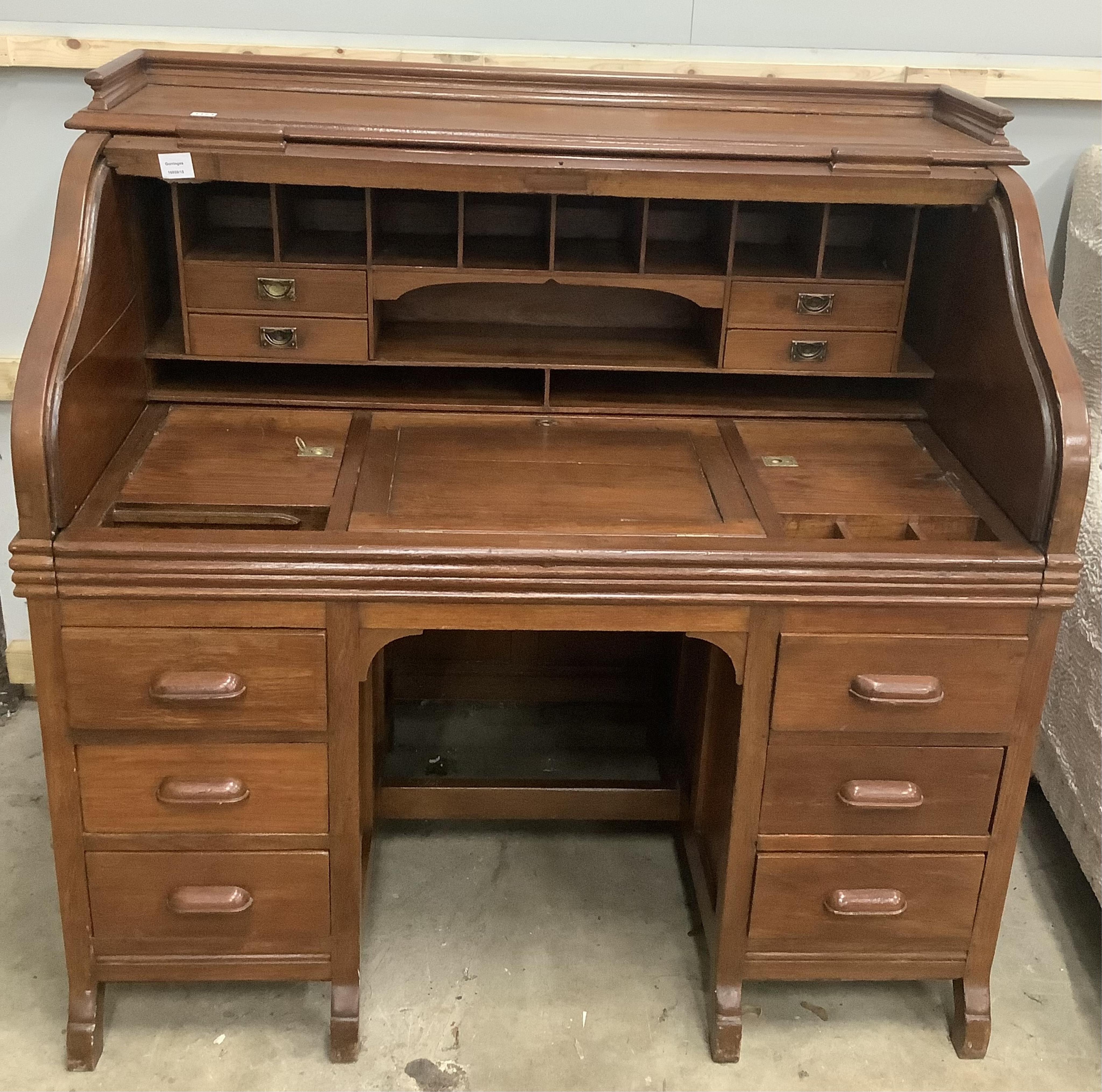 An early 19th century Anglo Indian roll top desk, width 125cm, depth 76cm, height 122cm. Condition - good